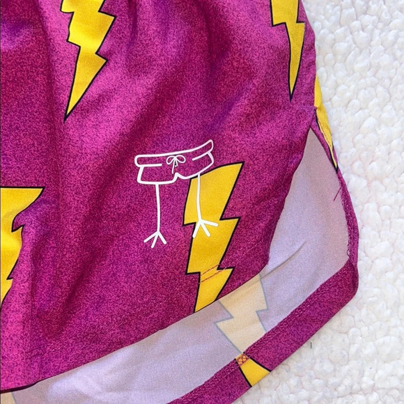 Vibrant Purple and Yellow Athletic Shorts with Lightning Pattern - Picture 3 of 9